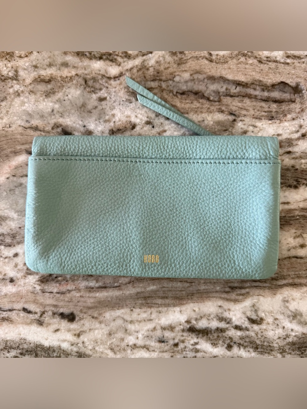 HOBO Lumen Continental Pale Green Leather Wallet with hidden snap closure